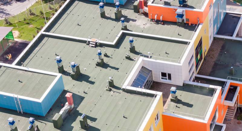 A roof with many different colored buildings on it